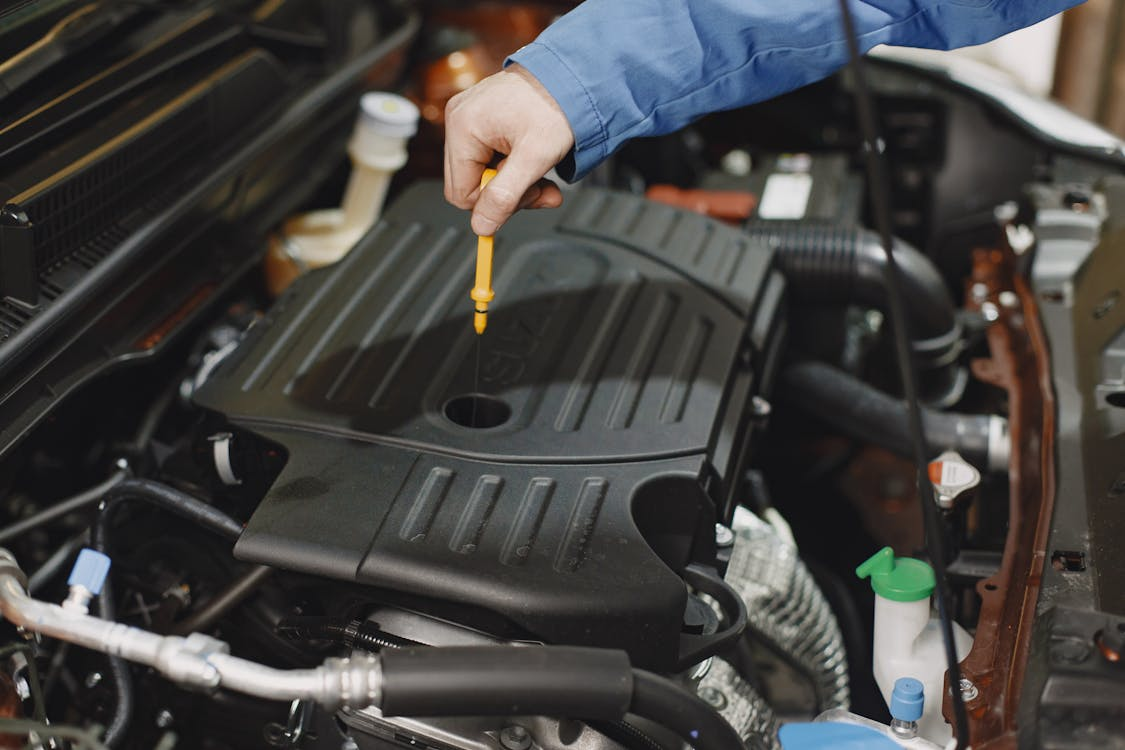 service expert working on a vehicle